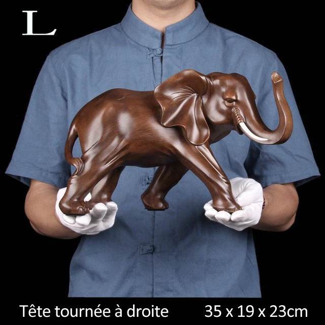 Statue elephant, taille large, tete vers la droite