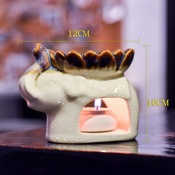 Les dimensions du brûleur huiles aromatiques éléphant