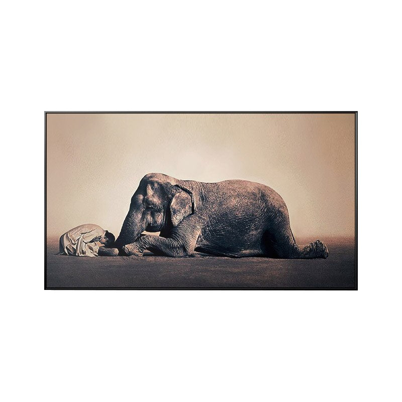 Toile photo elephant femme a genoux