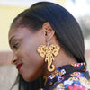 Boucles d'oreilles Afrique portées sur un modèle féminin