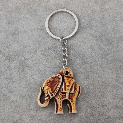 Porte-clef elephant tribal couleur beige antique