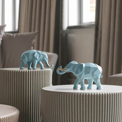 Exemple de decoration des deux statues elephants dans un salon moderne