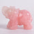 Statuette éléphant sculptée en cristal de roche rose (groupe des silicates)