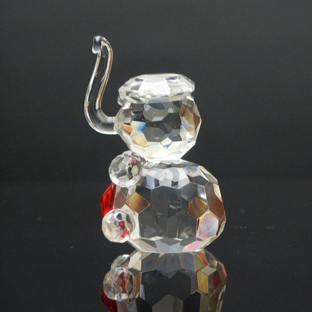 Statuette jeune elephant cristal coeur de profil