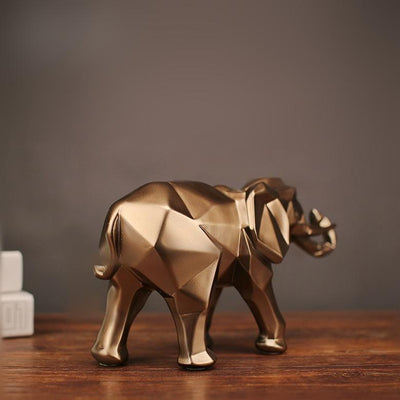 Vue arrière de la statue elephant forme géométrique, version dorée